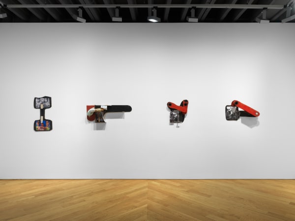 Installation view on the gallery's third floor of collages, which are 3 dimensional, unique, and vary in shape and content. Four works presented.