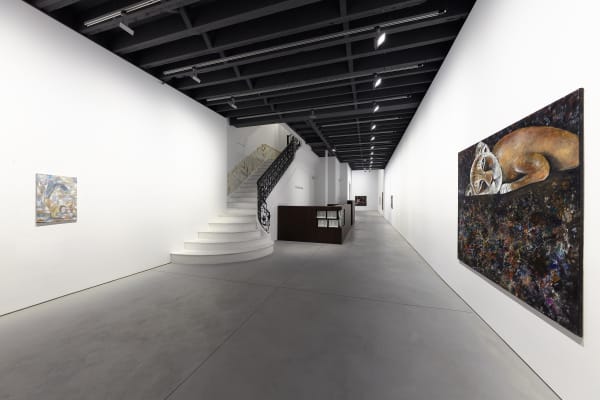 Installation view of frozen exhibition, entryway staircase and a few pieces featured.