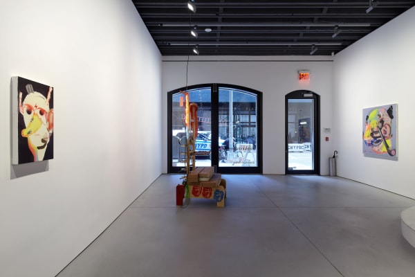 Installation view of Alessandro Pessoli's show Against Me. Three works shown, the one on the left being the title of the show "Against Me."