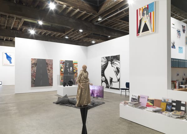 Installation view of Implosion, a 20 year anniversary show featuring all 28 artists on the Anton Kern Gallery roster. Francis Upritchard's monk amongst other pieces in the main gallery.