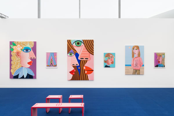 Installation view of Frieze Los Angeles 2023 booth C11 with view of blue floors, walls, artworks and ceiling.