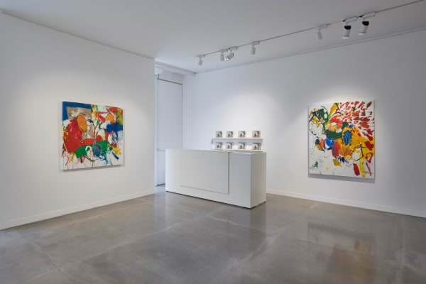 Installation image of two paintings by Luis Olaso at the front desk of JD Malat Gallery