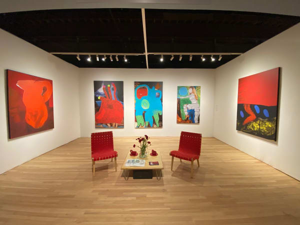 Installation image of five Semmes paintings from her Feminist Responsibility Project and two chairs 