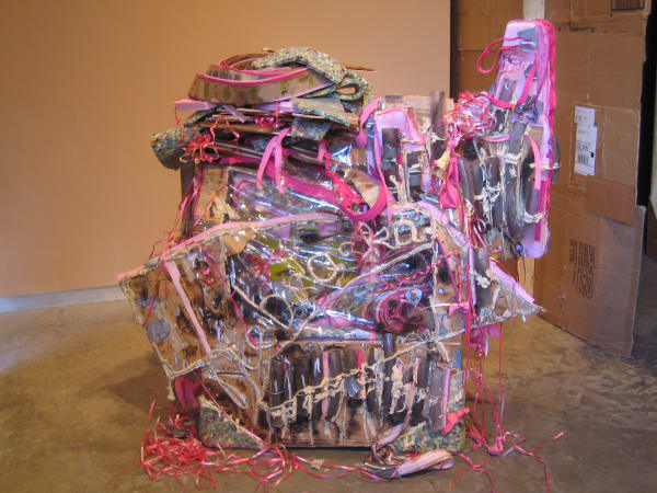 Sculpture created from detritus in the image of a projector