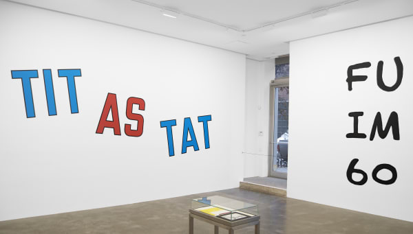 Installation view of  D.I.Y. exhibition, featuring Lawrence Weiner's TIT AS TAT and Jessica Diamond's I Chart. 