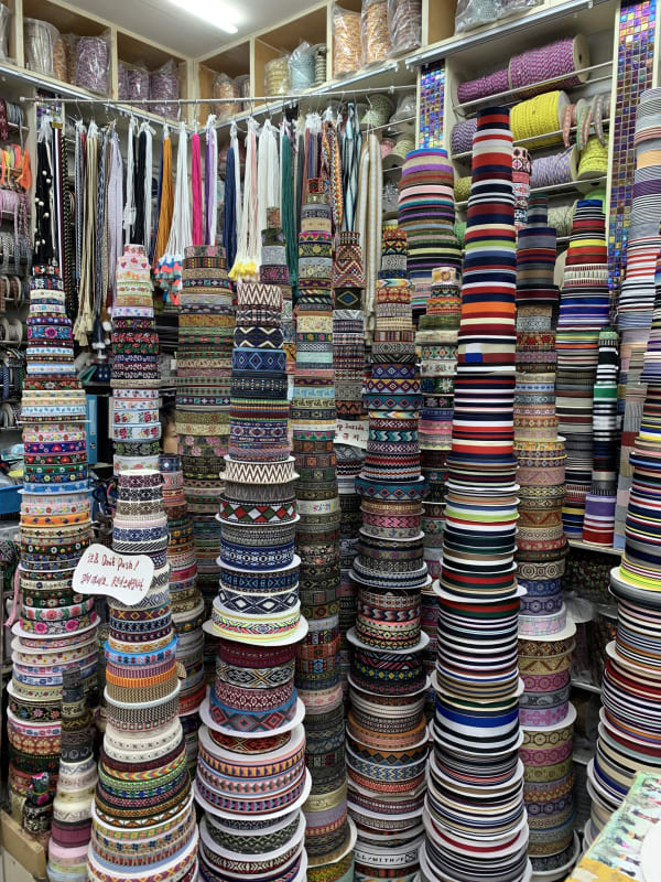 Photograph of a South Korean market stall selling ribbon
