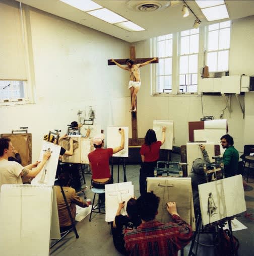 People sketching a large 