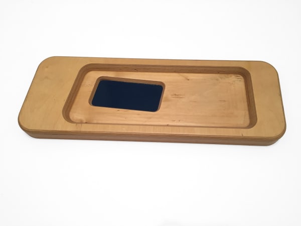 A wooden tray by Andrea Zittel