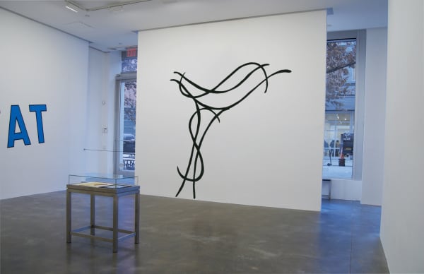 Installation view of Jessica Diamond wall mural piece "Money Dances" featuring two black dollar signs stacked 