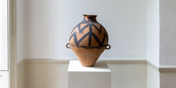 Gansu, 3rd-2nd millennium BC A neolithic pottery jar, Ma-Chang type, Yang-Shao culture. With stylised motifs of fishing nets and hands.