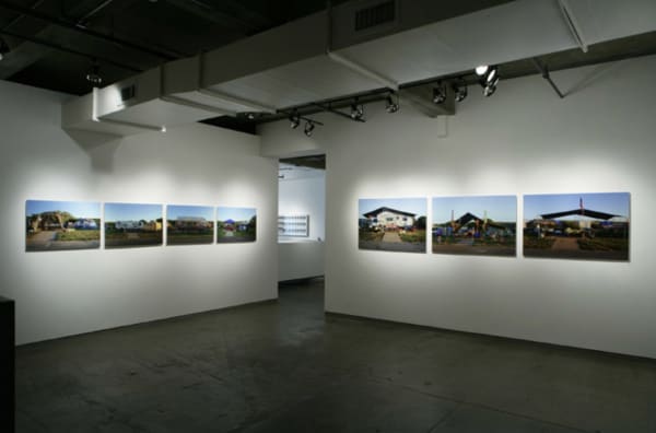 Two walls with Paul Aaron Johnson's work in gallery