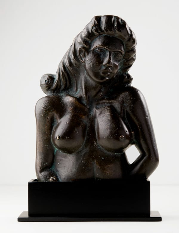 Erotic Doorbell, ca. 1950 Cast bronze with original doorbell hardware 8 1/4 x 6 x 1 3/4 in. (21 x 15.2 x 4.4 cm) (ArU 532) SOLD ••• Beyond its exquisite form and richly patinated surface, this object stages a sharp juxtaposition between the public and the private. On one hand, it makes a bold architectural statement—its substantial 14-pound weight and commanding silhouette speak to a deliberately assertive presence in a room. On the other hand, it conceals a secret: to ring the bell, one must discreetly press the right nipple. This hidden mechanism suggests the piece may have once belonged to an exclusive club or an eccentric private residence, where humor, sensuality, and secrecy were not only permitted but quietly engineered into the everyday ritual of arrival.