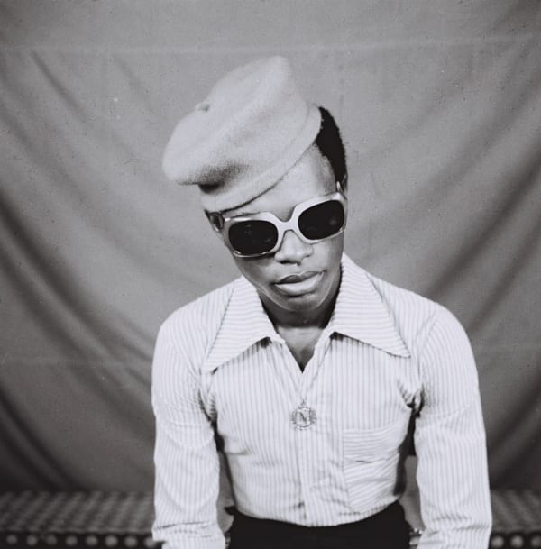 Featured Artwork:  Samuel Fosso (Cameroonian, b.1962)  Autoportrait from the series 70's Lifestyle, 1975-1978  Gelatin Silver Print  Image: 39 1/4" x 39 1/4" (100 x 100 cm)  Framed: 40 3/8" x 40 1/8" (102.5 x 102 cm)  (SFoss.21034)