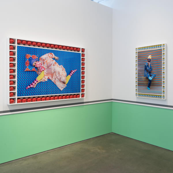 Installation View | Hassan Hajjaj: My Rockstars  Featured Artworks:  Hassan Hajjaj (Moroccan, b. 1961)  Sarah Perles Gazin', 2015 / 1436 (Gregorian/Hijri)  Metallic Lambda on Kodak Paper on 3mm Dibond in a Poplar Sprayed-White Frame with Red Tomato Squeezies  Image: 41" x 59" (104 x 150 cm)  Framed: 53 1/8" x 71" x 4 1/2" (135 x 180.5 x 11 cm)  Signed, Titled, Dated and Numbered Verso  in Ink Edition of 3 + 2 Artist’s Proofs  Hassan Hajjaj (Moroccan, b. 1961)  Marques, 2012/1433 (Gregorian/Hijri)  Metallic Lambda on 3mm Dibond in a Poplar Sprayed-White Frame with Medium Car Paint Tins  Image: 44" x 30" (112 x 76 cm)  Framed: 53 1/8” x 38 3/8” x 3 3/8" (135 x 97.5 x 8.5 cm)  Signed, Titled, Dated and Numbered Verso in Ink  From an Edition of 5 + 2 Artist’s Proofs