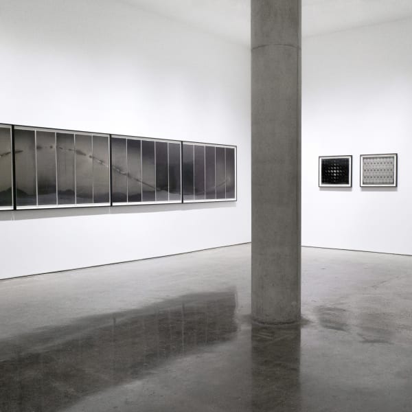 Installation View | Chris McCaw: Direct Positive  Featured Artworks: Chris McCaw (American, b. 1971) [Partial View] Sunburned GSP#860, 2015 Twenty Five Gelatin Silver Paper Negatives Dimensions, each element: 40" x 12" (101.5 x 30.5 cm) Framed, each element: 43 3/4" x 62 7/8" (111 x 159.5 cm) – in five frames Overall, installed: approximately 43 3/4" x 26' 3" (111 x 800 cm) Unique (CM.15998)  Chris McCaw (American, b. 1971) Poly-optic #36, 2014 Gelatin Silver Paper Negative 20" x 24" (50.8 x 61 cm) Framed: 23 3/4" x 27 1/2" (60.3 x 69.8 cm) (CM.15342)  Chris McCaw (American, b. 1971) Poly-optic #49, 2015 Gelatin Silver Paper Negative 20" x 24" (50.8 x 61 cm) Framed: 23 5/8" X 27 5/8" (60 X 70.2 cm) (CM.15774)