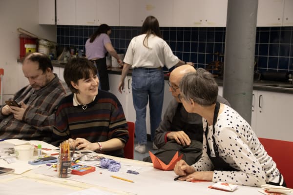 Attendees of free drop-in creative session making Victorian Valentines.