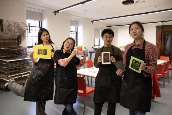 Attendees of free drop-in creative session in linocut.