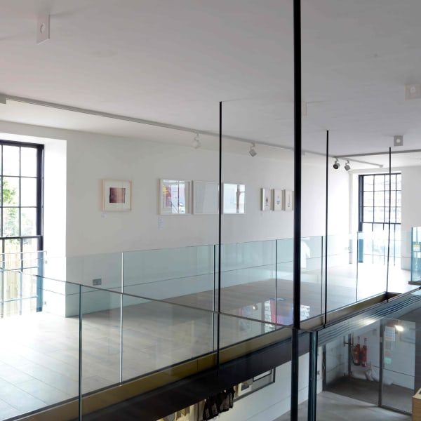 Gallery 2 with prints on the wall