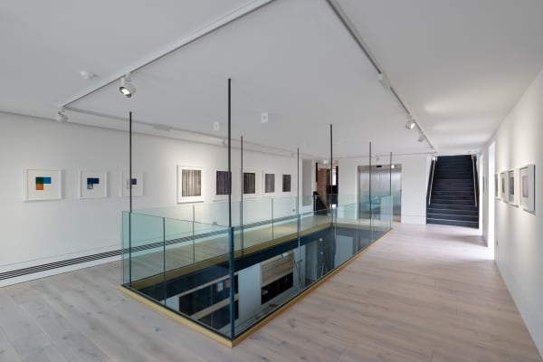 Gallery 2 with prints on the wall