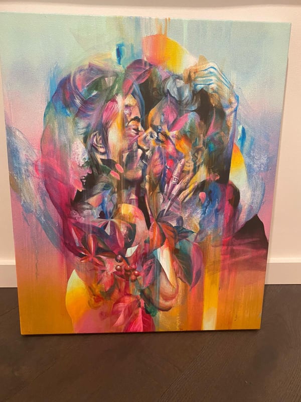 Hueman artwork of abstract human figures kissing using spray paint and acrylic.
