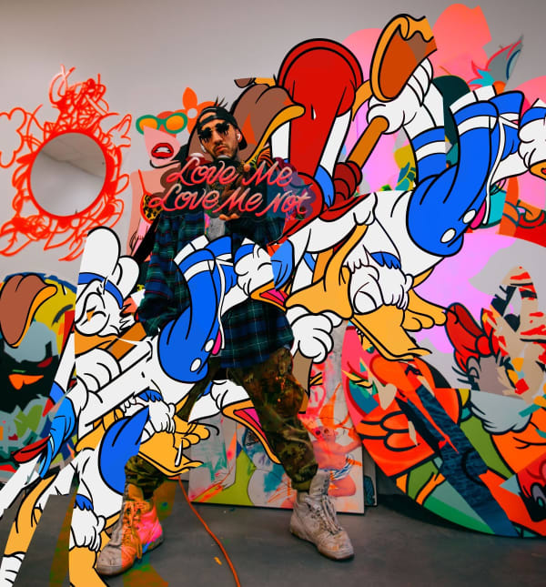 Timmy Sneaks holding the phrase Love Me, Love Me Not.