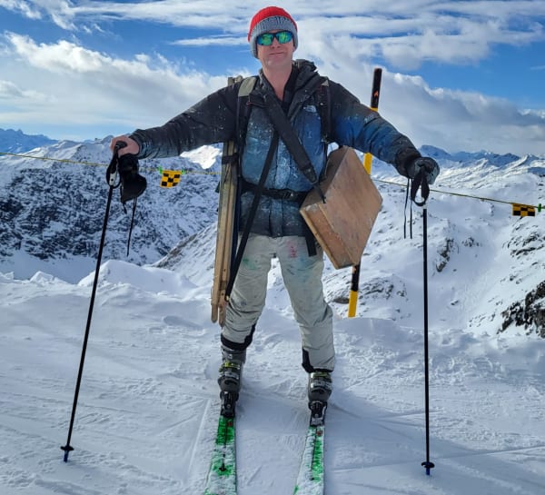 Oliver Akers Douglas painting in the Alps. © The Artist.