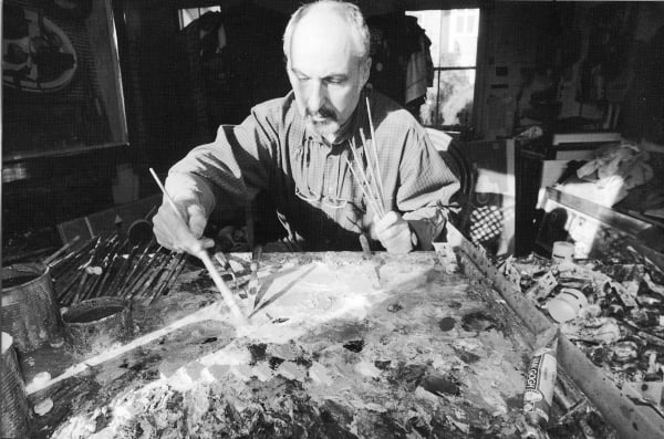 Leon Morrocco preparing his paints