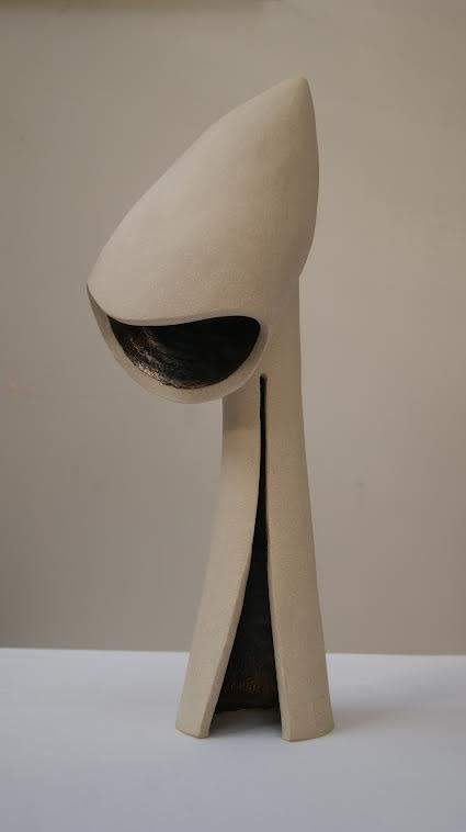 HARRIET FERRIS Viewer 1 28cm x 10cm White stoneware with internal dark gold glaze. £300