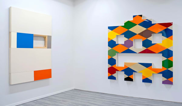 Installation shot: Left: Max Estenger, Osha (White, Blue and Orange), 1995 ©Max Estenger | Right: Mark Dagley Hero, 1987 ©Mark Dagley