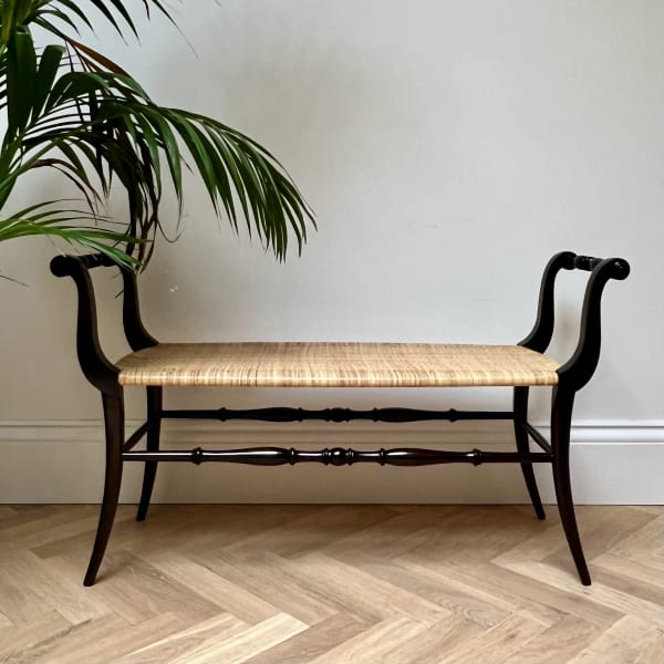 Italian, An Ebonized Wood and Rattan Bench, Circa 1950s