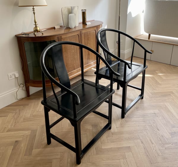 Chinese, A Pair of Ebonized Horseshoe Chairs, Circa 1930s