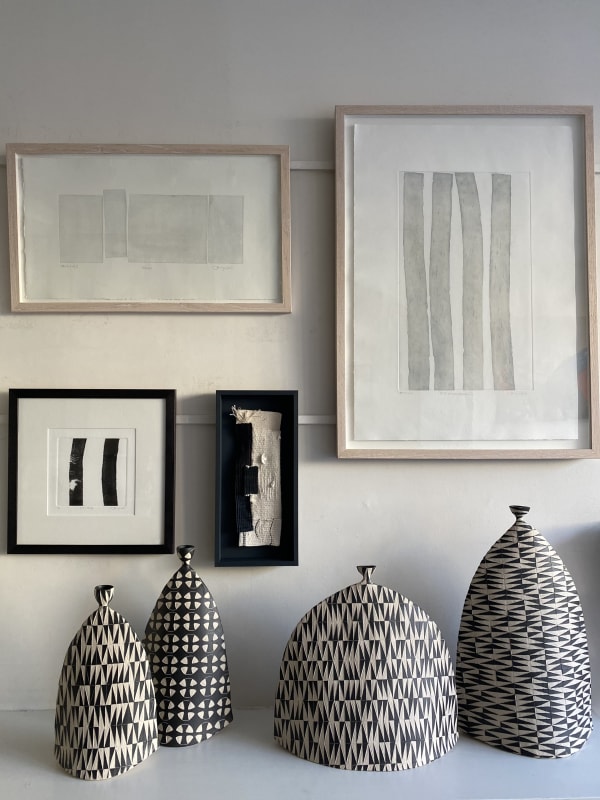 Print and tapestry by Jacy Wall alongside ceramic sculptures by Björk Haraldsdóttir