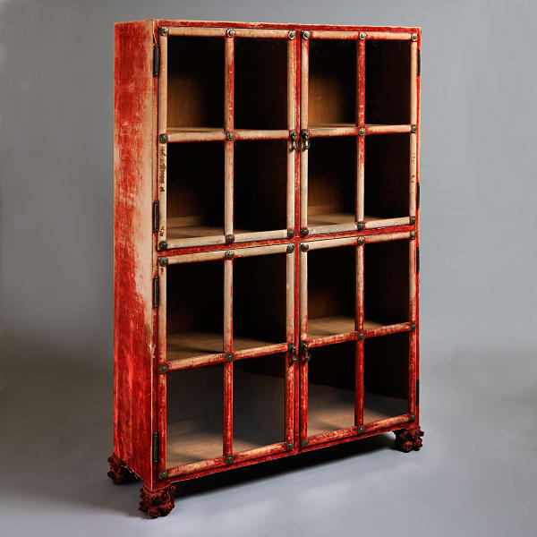 Crimson velvet bookcase attributed to Lenygon & Sons, circa 1900