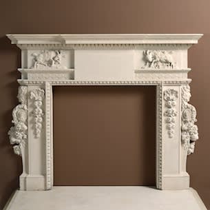 GEORGE II PORTLAND STONE CHIMNEY-PIECE FROM THE WORKSHOPS OF SIR HENRY CHEERE, CIRCA 1738