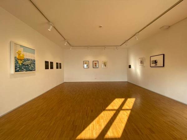 Banksy artworks hanging on wall