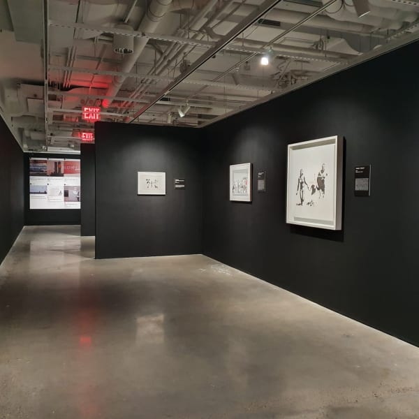 Banksy artworks hanging on wall