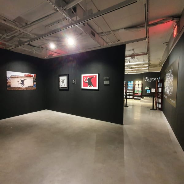 Banksy artworks hanging on wall