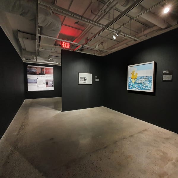 Banksy artworks hanging on wall