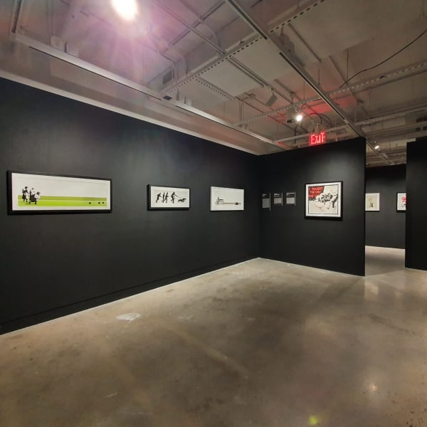 Banksy artworks hanging on wall