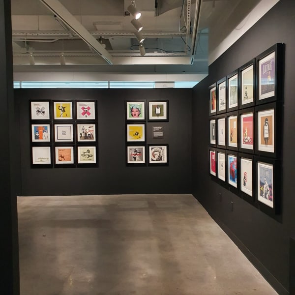 Banksy artworks hanging on wall