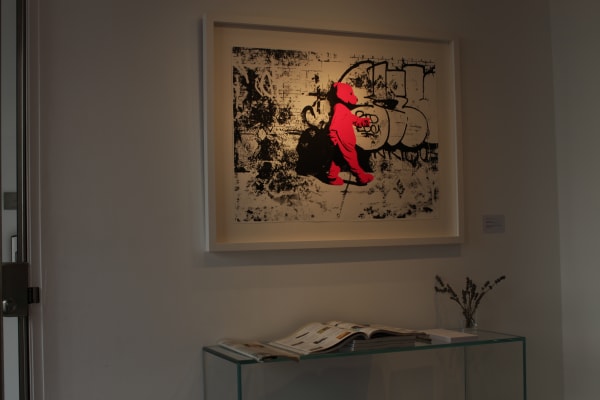 Paul Robinson artworks hanging on the wall