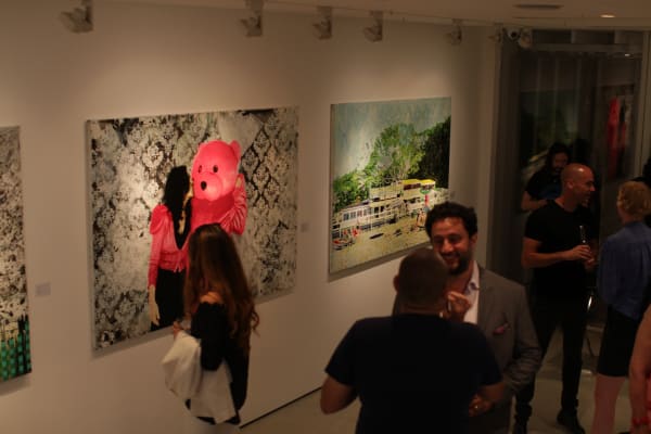 Paul Robinson artworks hanging on the wall