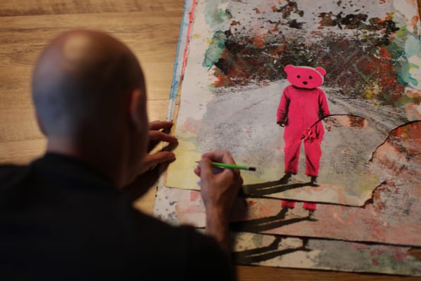 Paul Robinson artworks hanging on the wall