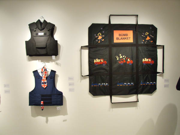 Banksy artworks hanging on wall