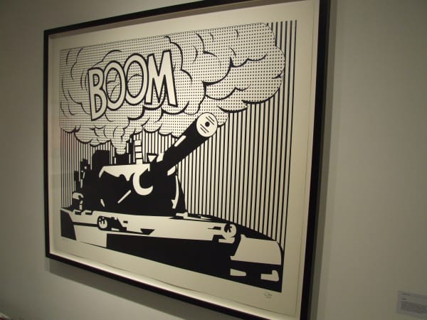 Banksy artworks hanging on wall