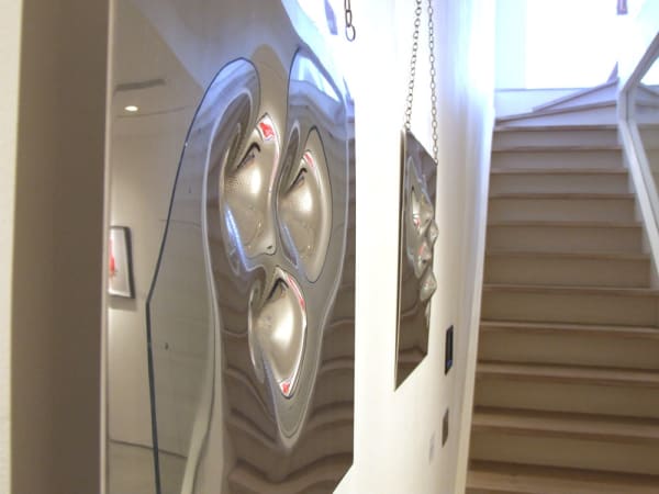 Banksy artworks hanging on wall