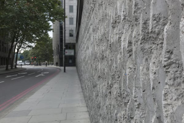 Slinkachu Alive context shot (wall)