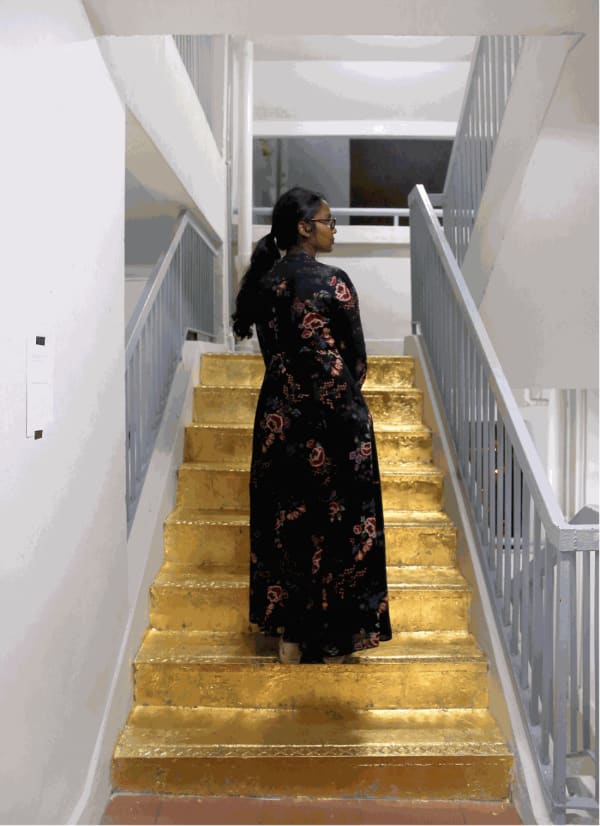 STRAIT TIMES | It's art, not vandalism, says student behind golden staircase