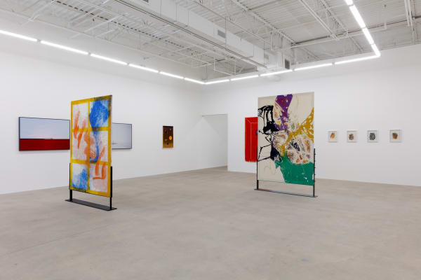 installation view of How Far is In-Between, featuring paintings and drawings