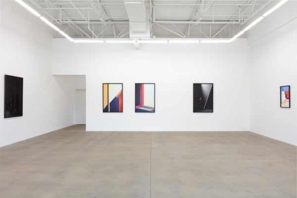 installation view of photographs by Popel Coumou